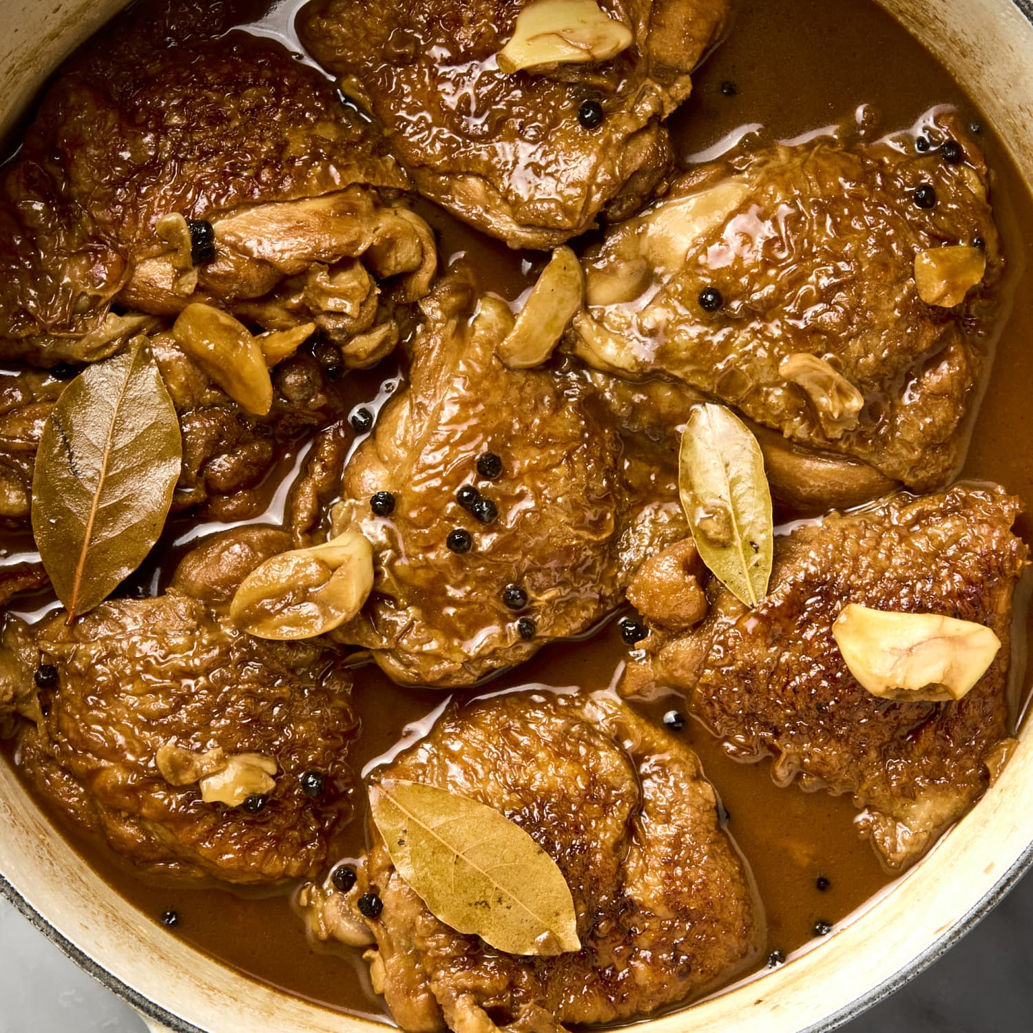 A bowl of cooked chicken adobo.